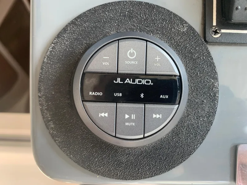 Slide: The Image of JL Audio control panel on 2008 Pursuit 315 OS boat dashboard. - 40