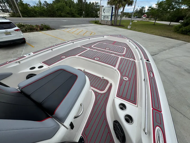 Slide: The Image of 2018 ShearWater 260 Carolina Flare boat with sleek deck design and comfortable seating. - 15