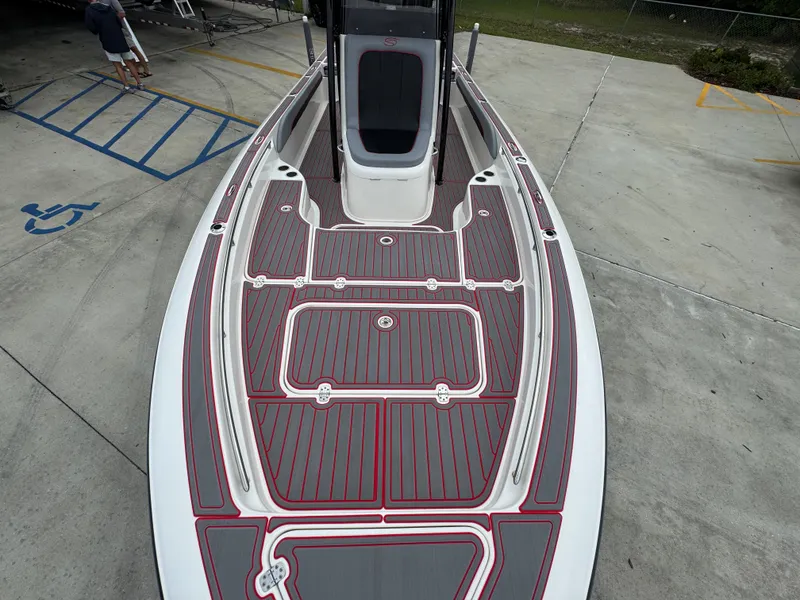 Slide: The Image of 2018 ShearWater 260 Carolina Flare boat deck with sleek design and modern features. - 16