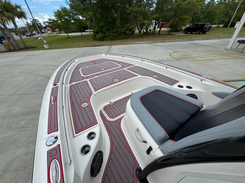 Slide: The Image of 2018 ShearWater 260 Carolina Flare boat with sleek deck design and comfortable seating. - 19