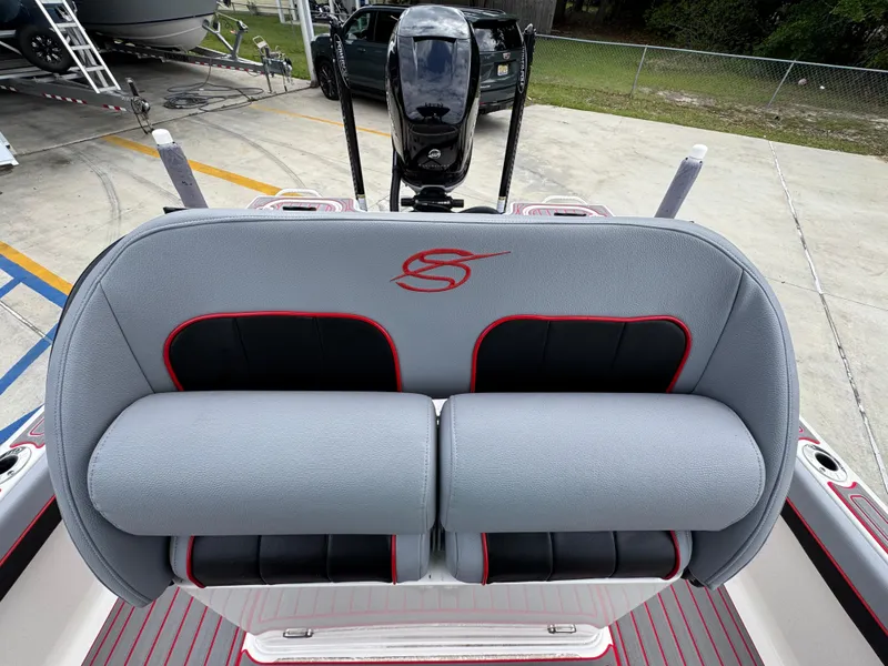 Slide: The Image of 2018 ShearWater 260 Carolina Flare boat seating with gray and red accents. - 23