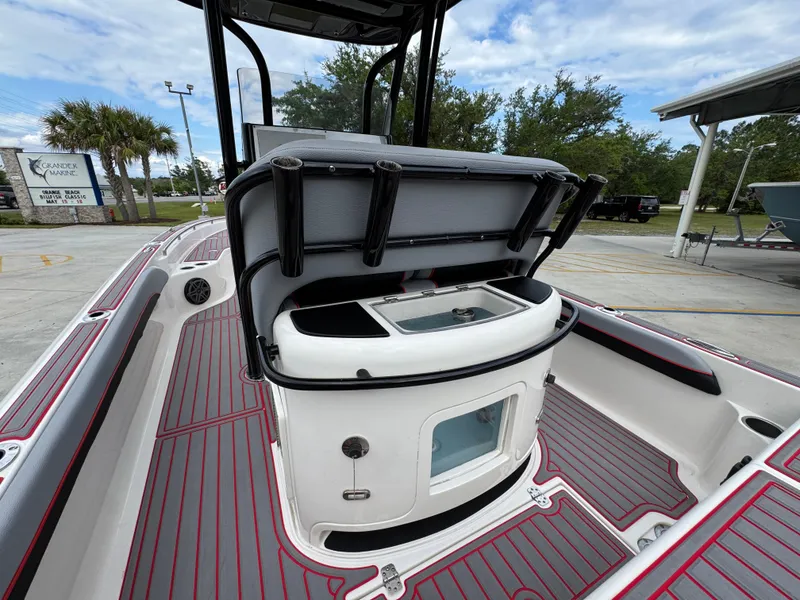 Slide: The Image of 2018 ShearWater 260 Carolina Flare boat interior with open storage compartment. - 27