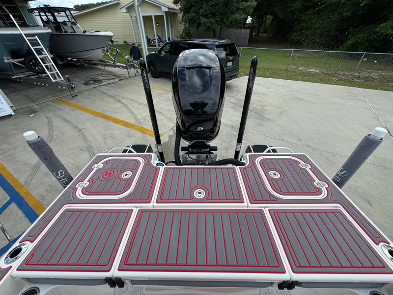 Slide: The Image of 2018 ShearWater 260 Carolina Flare boat with motor, docked in a yard. - 30