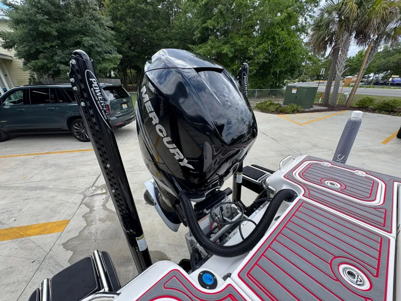 Slide: The Image of 2018 ShearWater 260 Carolina Flare boat with Mercury engine, parked outdoors. - 32