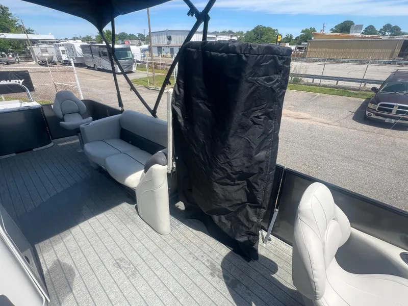 Slide: The Image of 2021 Sylvan Mirage Fish 8522 Party Fish 4.0 pontoon boat interior with seating and cover. - 25