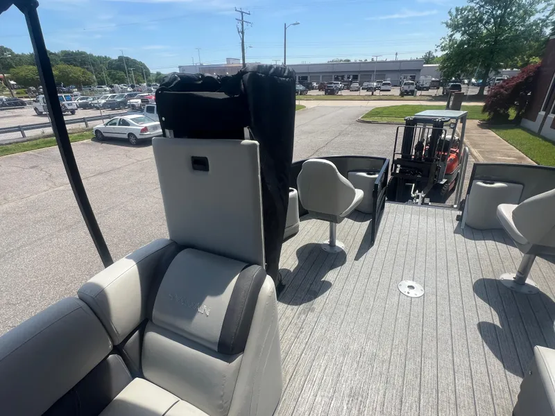 Slide: The Image of 2021 Sylvan Mirage Fish 8522 Party Fish 4.0 pontoon boat interior with seating and deck view. - 26