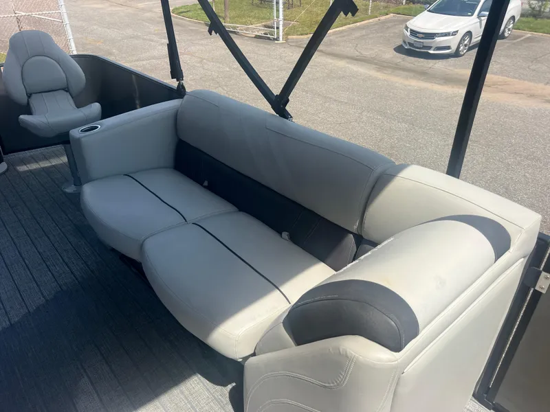 Slide: The Image of 2021 Sylvan Mirage Fish 8522 Party Fish 4.0 boat interior with gray seating. - 27