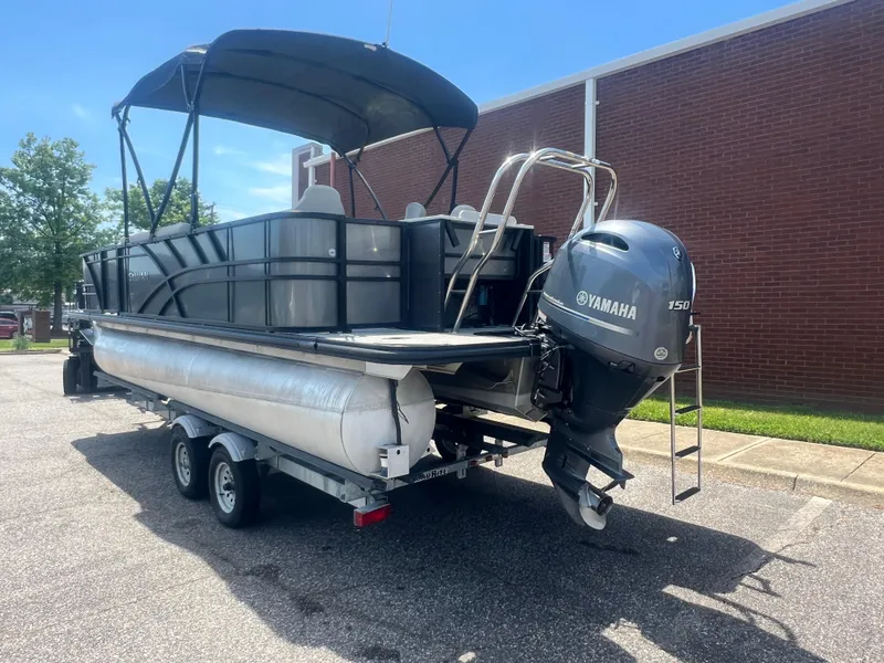 Slide: The Image of 2021 Sylvan Mirage Fish 8522 pontoon boat with Yamaha motor on trailer. - 6