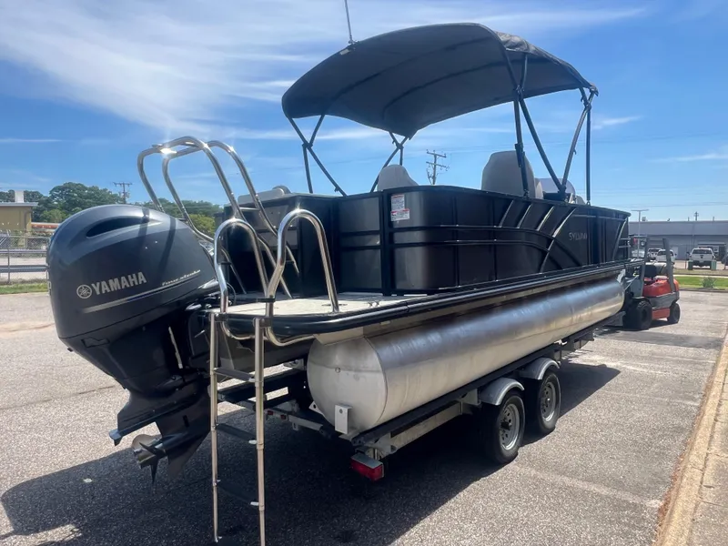 Slide: The Image of 2021 Sylvan Mirage Fish 8522 Party Fish pontoon boat on trailer with Yamaha engine. - 9