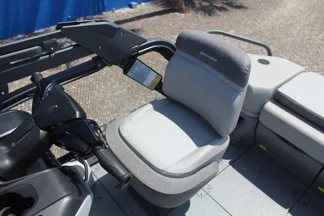 Slide: The Image of 2024 Sea-Doo Switch® Cruise 18 interior with steering and seating area. - 14