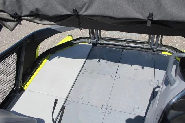 Slide: The Image of 2024 Sea-Doo Switch® Cruise 18 interior deck, featuring modular seating and durable flooring. - 15