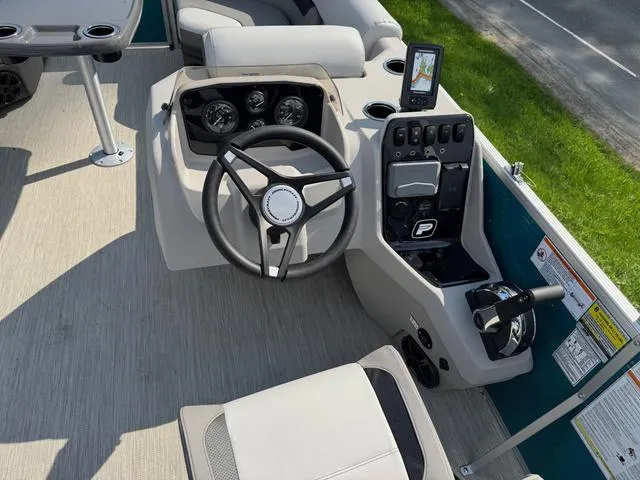 Slide: The Image of 2025 Princecraft Vectra 19 L 60HP boat interior with seating and storage area. - 13
