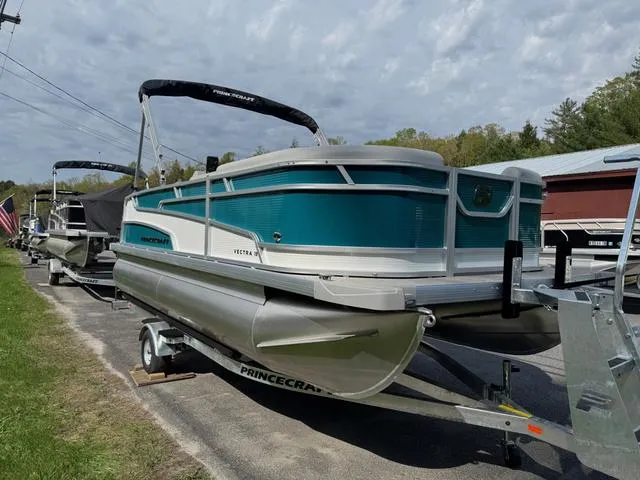 Slide: The Image of 2025 Princecraft Vectra 19 L 60HP pontoon boat on trailer, parked outdoors. - 5