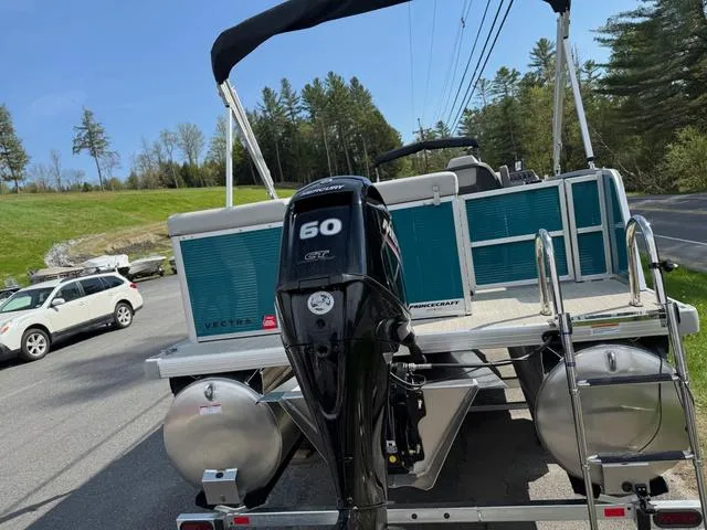 Slide: The Image of 2025 Princecraft Vectra 19 L 60HP pontoon boat with spacious seating and table. - 7