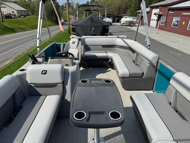 Slide: The Image of 2025 Princecraft Vectra 19 L 60HP pontoon boat with spacious seating and table. - 8