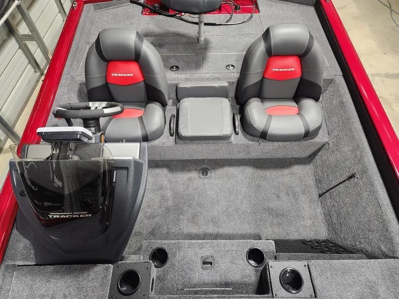 Slide: The Image of 2025 Tracker Pro Team™ 195 Tournament Edition boat interior with dual seats and steering console. - 2
