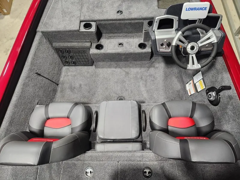 Slide: The Image of 2025 Tracker Pro Team™ 195 Tournament Edition boat interior with steering wheel and seating. - 7