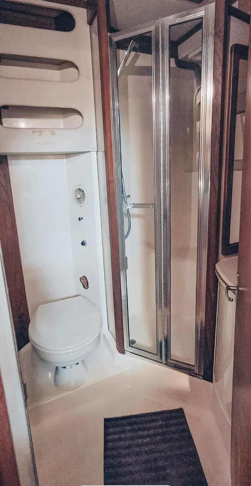 Slide: The Image of Bathroom interior of 1993 Luhrs 350 Tournament yacht with shower and toilet. - 11