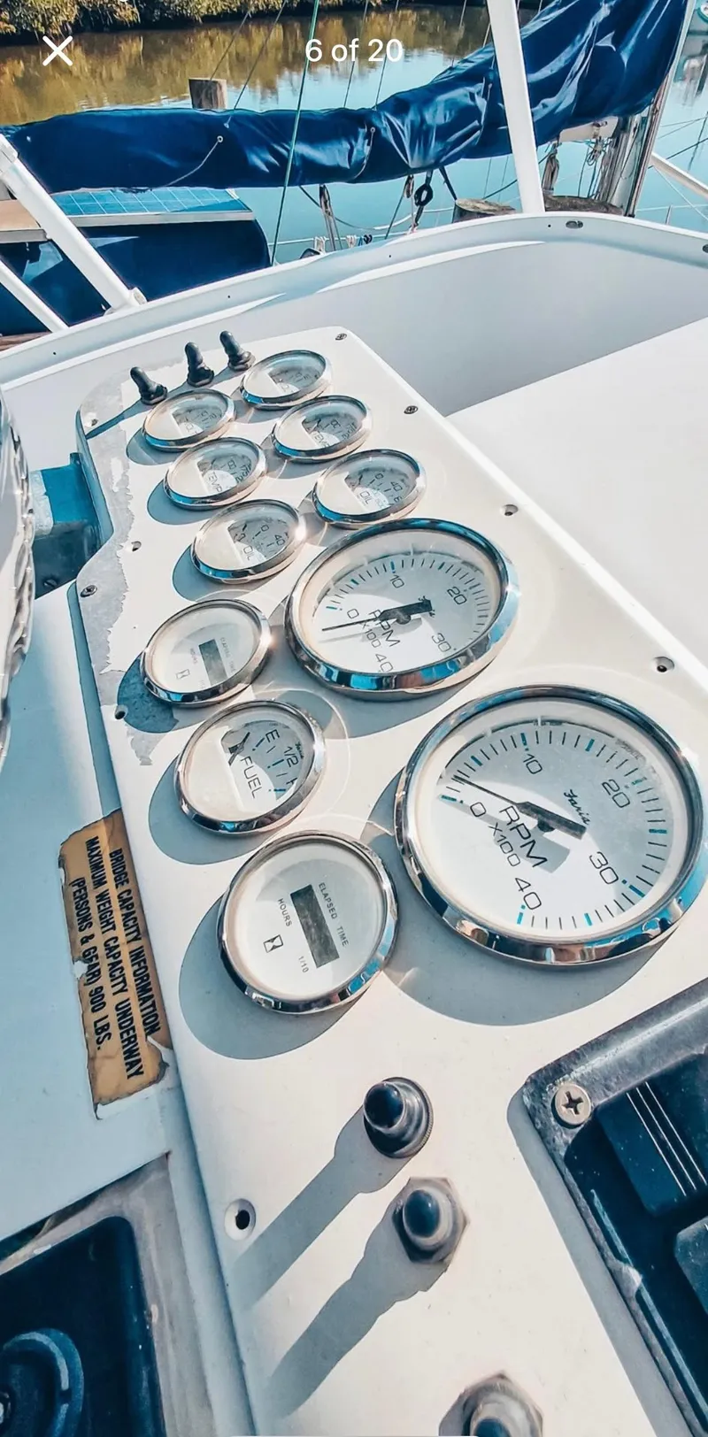 Slide: The Image of Instrument panel of 1993 Luhrs 350 Tournament boat with various gauges and controls. - 5