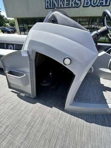Slide: The Image of 2020 Bennington 22 SX boat console with storage compartment, located at Rinkers Boat World. - 16