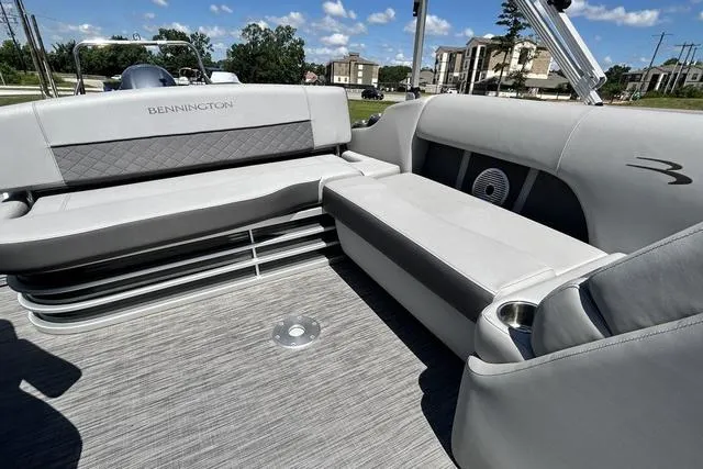Slide: The Image of 2020 Bennington 22 SX boat interior with gray seating and modern design. - 20
