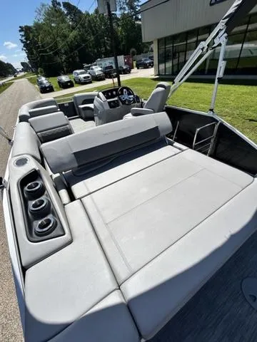 Slide: The Image of 2020 Bennington 22 SX pontoon boat with spacious seating and modern design. - 24