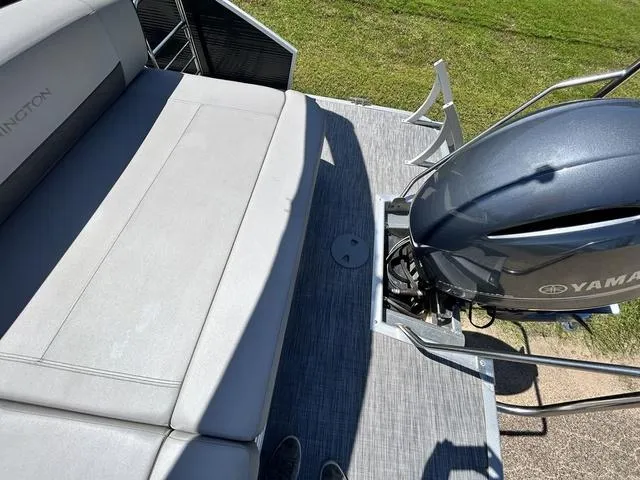 Slide: The Image of 2020 Bennington 22 SX pontoon boat with Yamaha outboard motor, featuring spacious seating. - 27