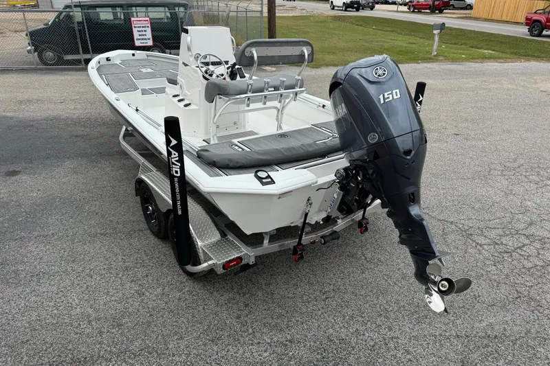 Slide: The Image of Avid 21 Mag 2025 boat with Yamaha 150 engine on trailer. - 1