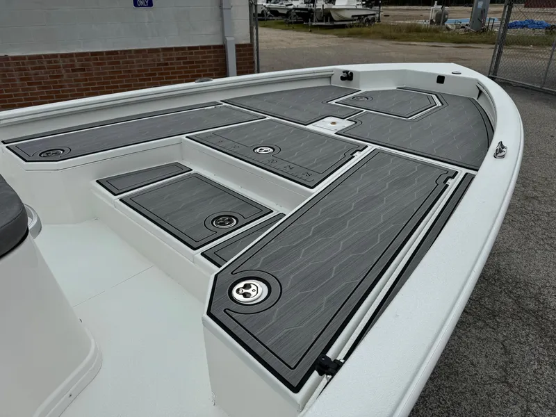 Slide: The Image of 2025 Avid 21 Mag boat deck with sleek gray non-slip surface. - 11
