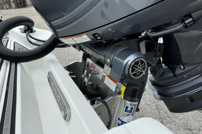 Slide: The Image of Avid 21 Mag 2025 boat engine detail with Yamaha motor and Atlas components. - 12
