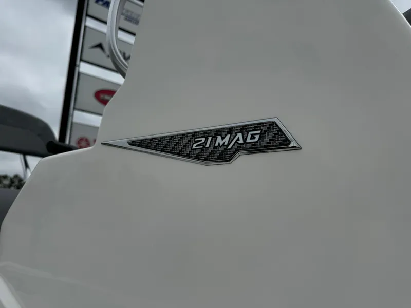 Slide: The Image of Avid 21 Mag 2025 model logo on a sleek white surface. - 13
