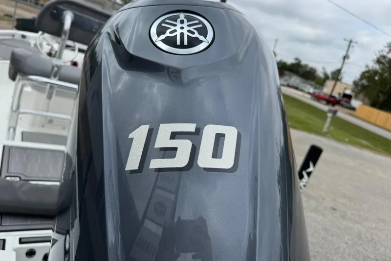 Slide: The Image of Yamaha 150 horsepower outboard motor on Avid 21 Mag boat, 2025 model. - 14
