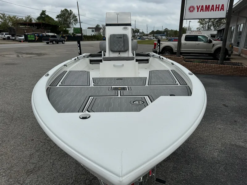 Slide: The Image of Avid 21 Mag 2025 boat displayed outdoors near Yamaha dealership. - 5