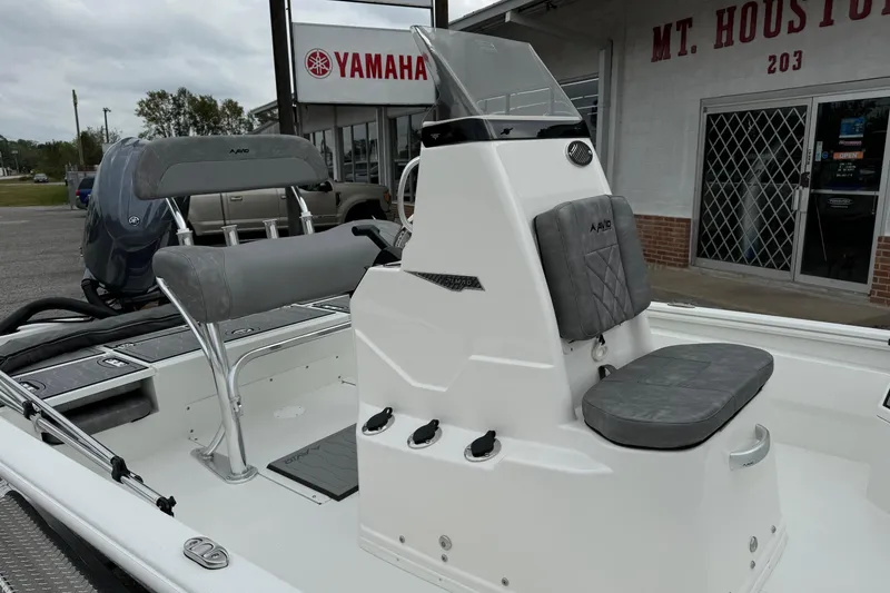 Slide: The Image of 2025 Avid 21 Mag boat interior with seating, near Yamaha dealership. - 8