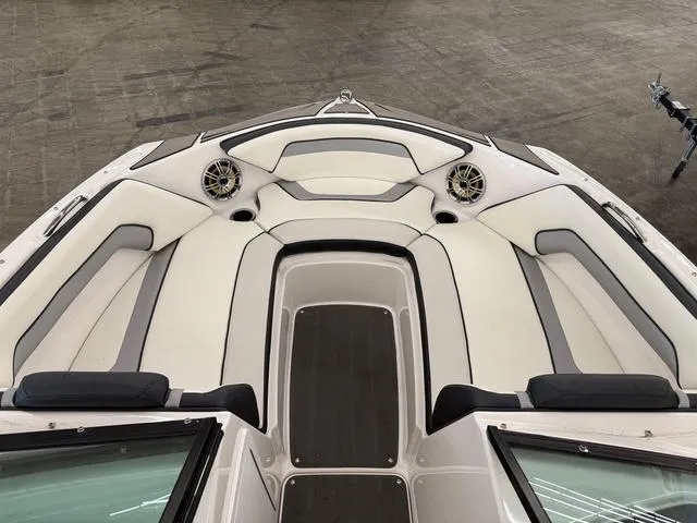 Slide: The Image of 2017 Yamaha SX195 boat interior with sleek white and gray seating. - 19