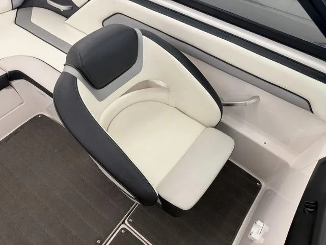 Slide: The Image of 2017 Yamaha Boats SX195 interior seat, featuring sleek black and white design. - 11