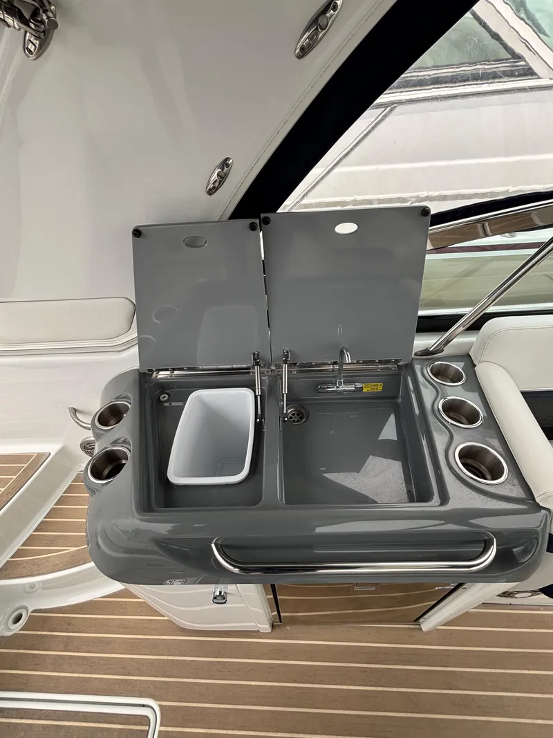 Slide: The Image of 2014 Formula 350 CBR boat sink and cup holders on deck. - 21