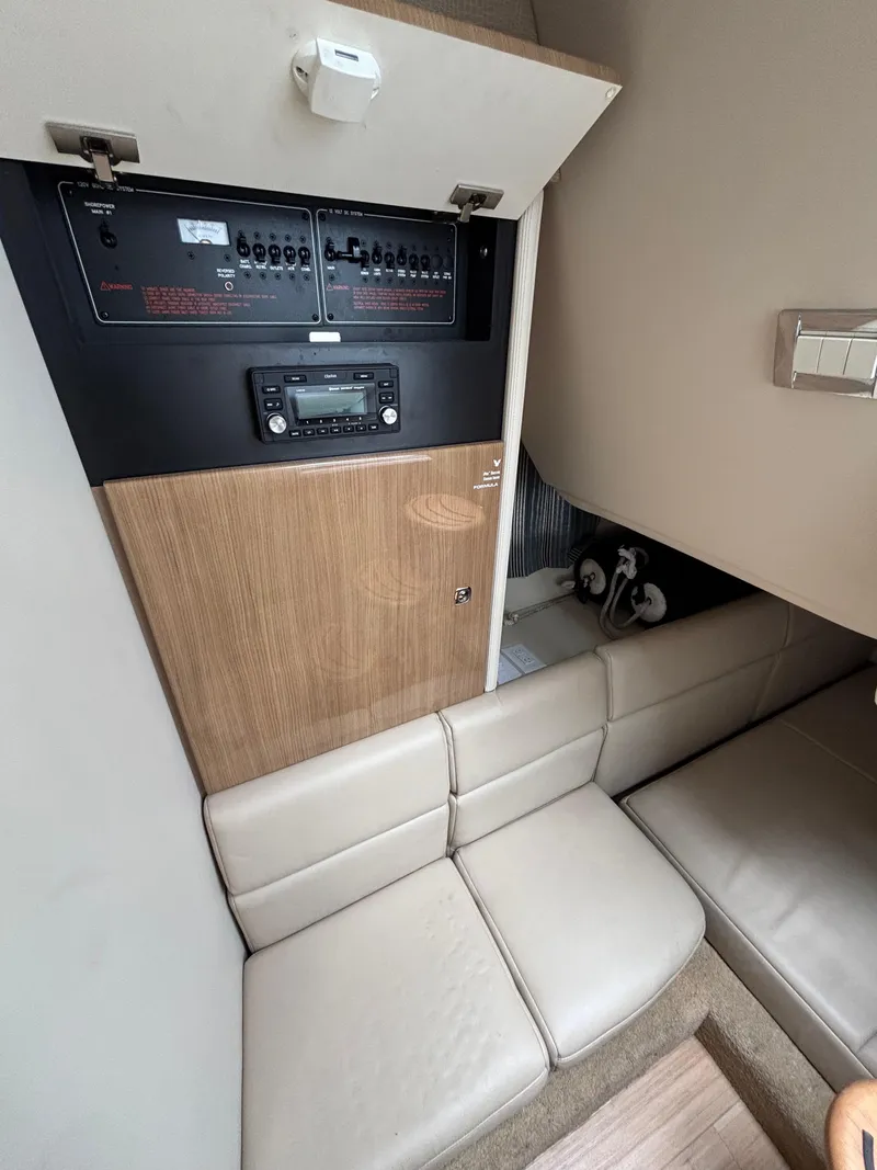 Slide: The Image of 2014 Formula 350 CBR cabin interior with seating and control panel. - 24