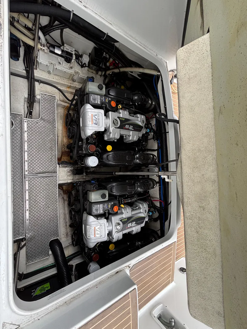 Slide: The Image of 2014 Formula 350 CBR engine compartment with dual engines and visible components. - 26