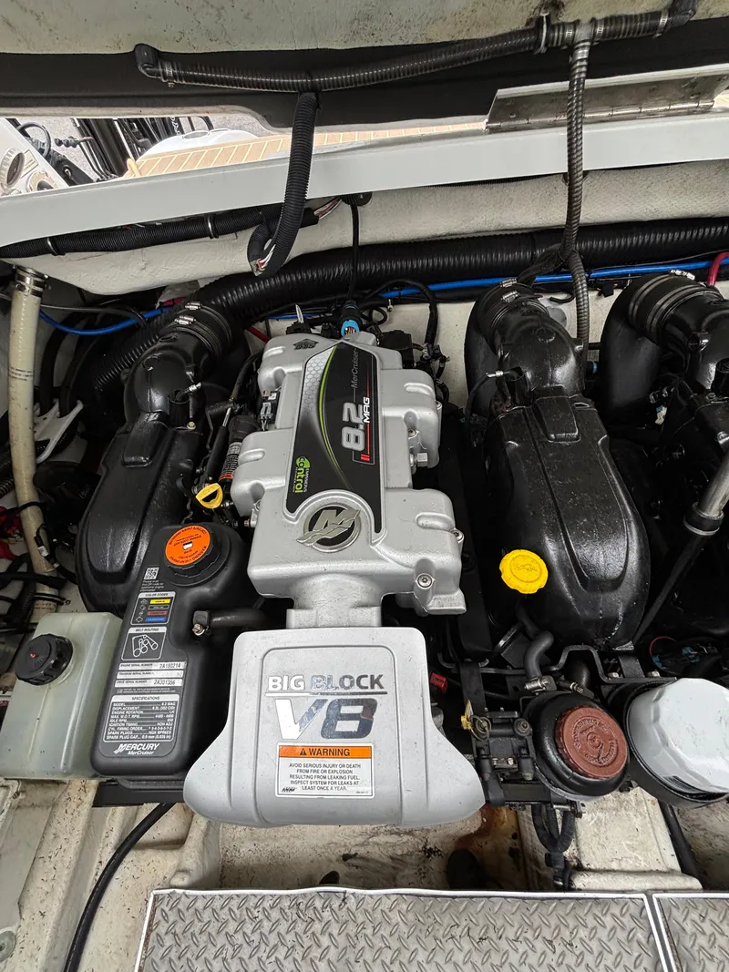 Slide: The Image of Engine compartment of a 2014 Formula 350 CBR with a powerful V8 engine. - 28