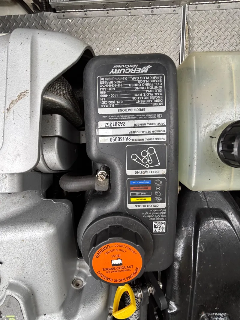 Slide: The Image of Engine compartment of a 2014 Formula 350 CBR with Mercury components and fluid reservoirs. - 29