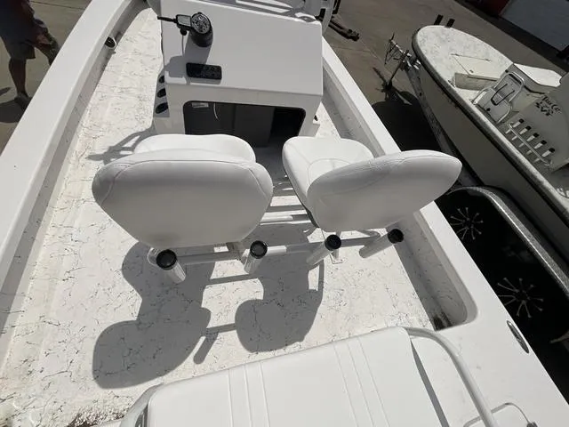 Slide: The Image of 2025 Majek 2206 Illusion boat interior with white seating and console. - 13