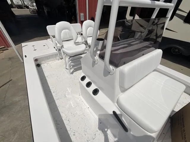 Slide: The Image of 2025 Majek 2206 Illusion boat interior with white seating and console. - 9