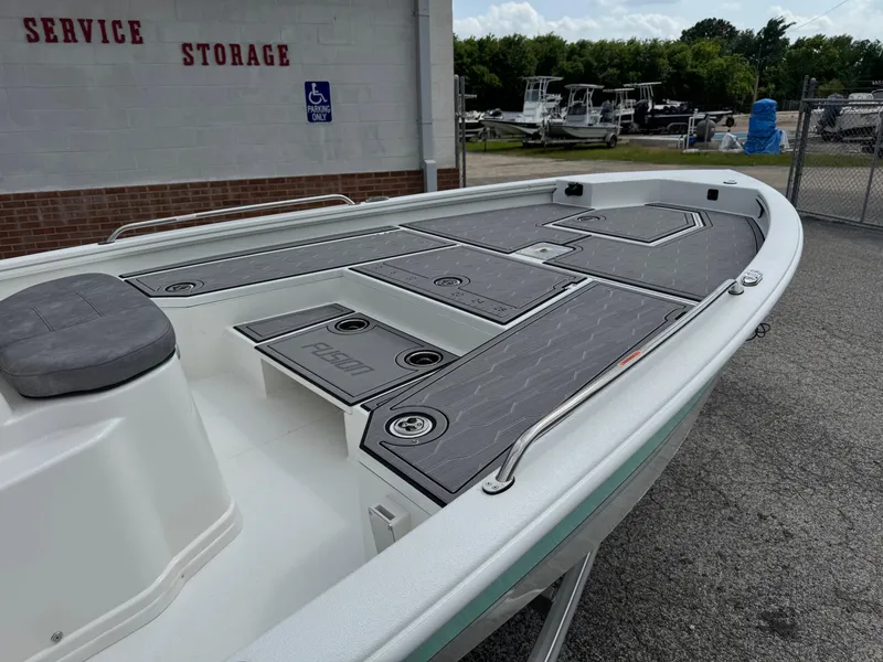 Slide: The Image of Avid 21 Fusion 2025 boat deck, featuring sleek design and storage compartments. - 10