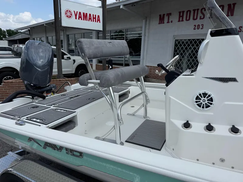 Slide: The Image of Avid 21 Fusion 2025 boat with Yamaha engine at dealership. - 14