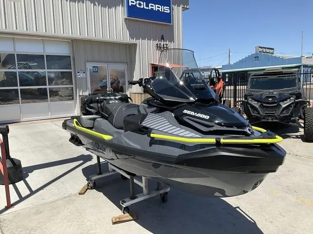 Slide: The Image of 2025 Sea-Doo Waverunner Explorer Pro displayed outside a dealership. - 3