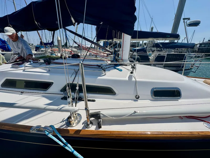 Slide: The Image of 2007 Sabre Spirit sailboat docked at marina with visible rigging and deck details. - 30