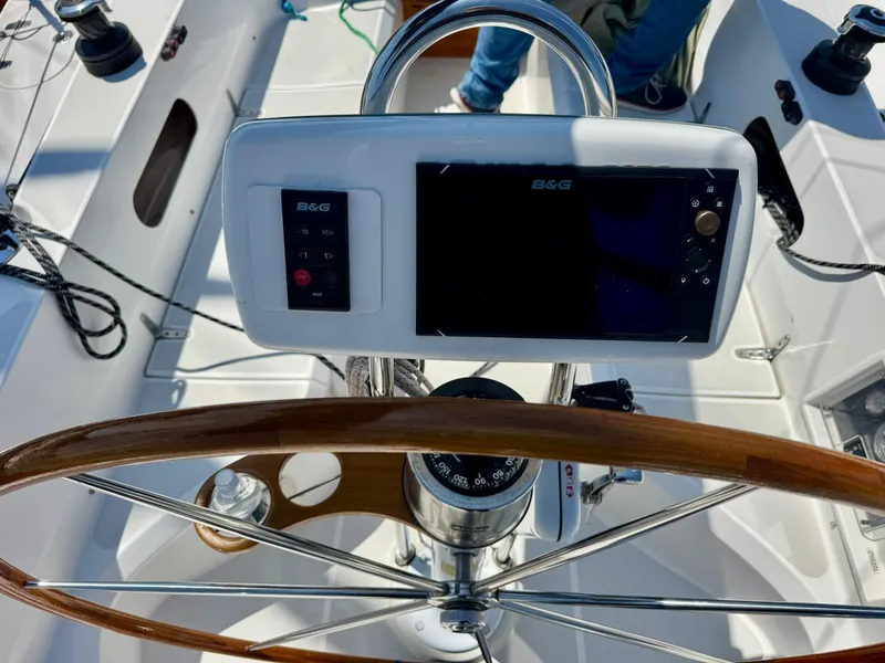 Slide: The Image of Steering wheel and navigation system on a 2007 Sabre Spirit sailboat. - 32