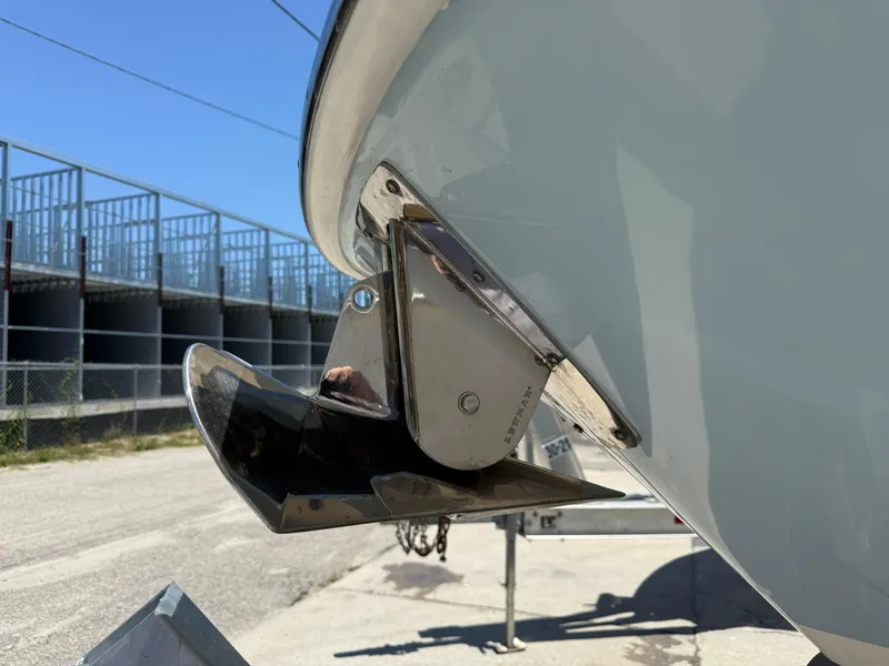 Slide: The Image of 2020 Boston Whaler 230 Vantage boat anchor detail in a sunny outdoor setting. - 11