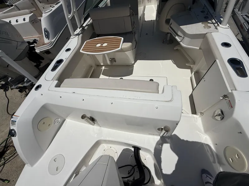 Slide: The Image of 2020 Boston Whaler 230 Vantage boat interior with seating and table. - 22